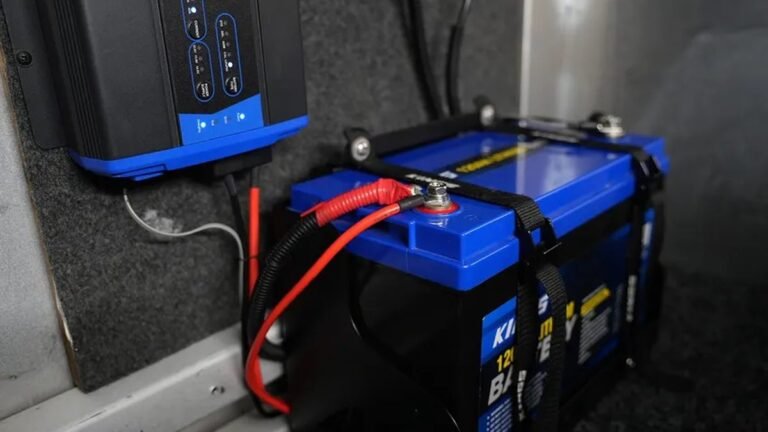 12V lithium camping battery installed in a 4WD canopy