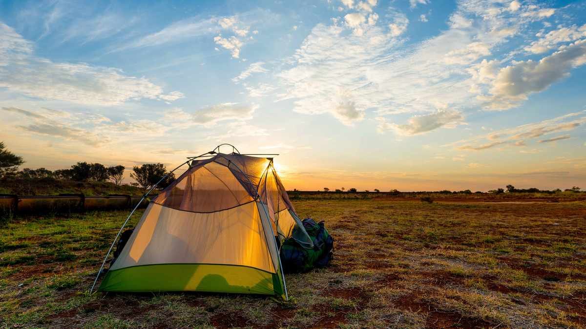 Best Camping Tents Australia 2026 1 Canvas touring tent pitched in the Australian bush at sunset. best camping tents Australia