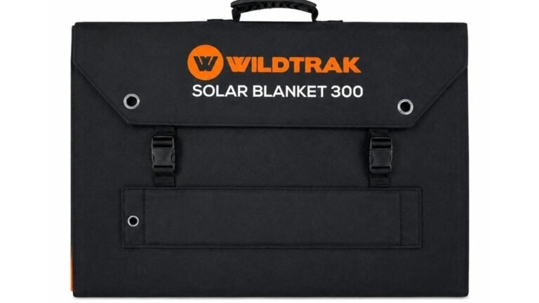 Best Solar Panels for Camping Australia 2026 2 Folding solar panels charging at a campsite beside a 4WD